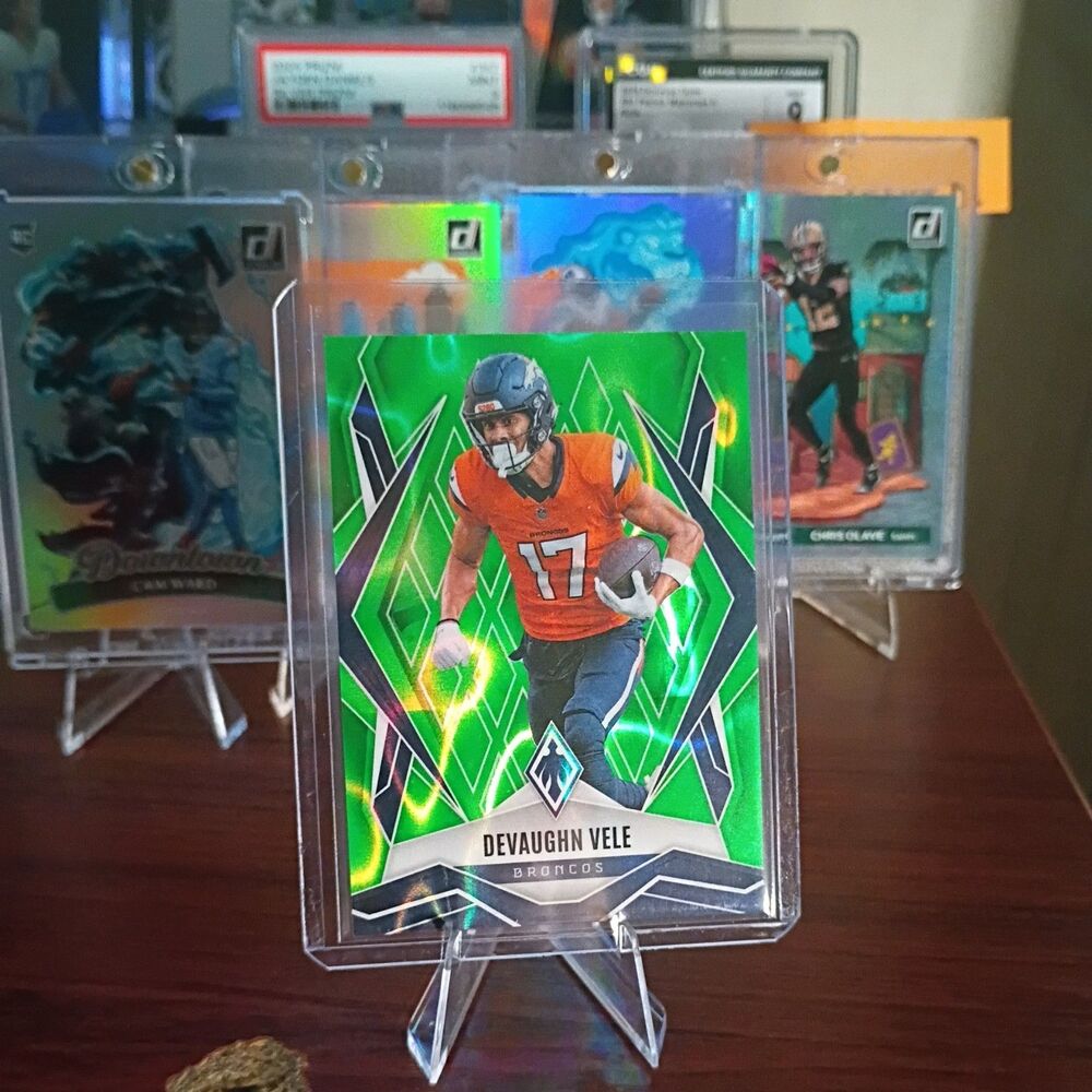2025 Panini Phoenix - Devaughn Vele #14 Lime Green Lava /225 Denver Broncos